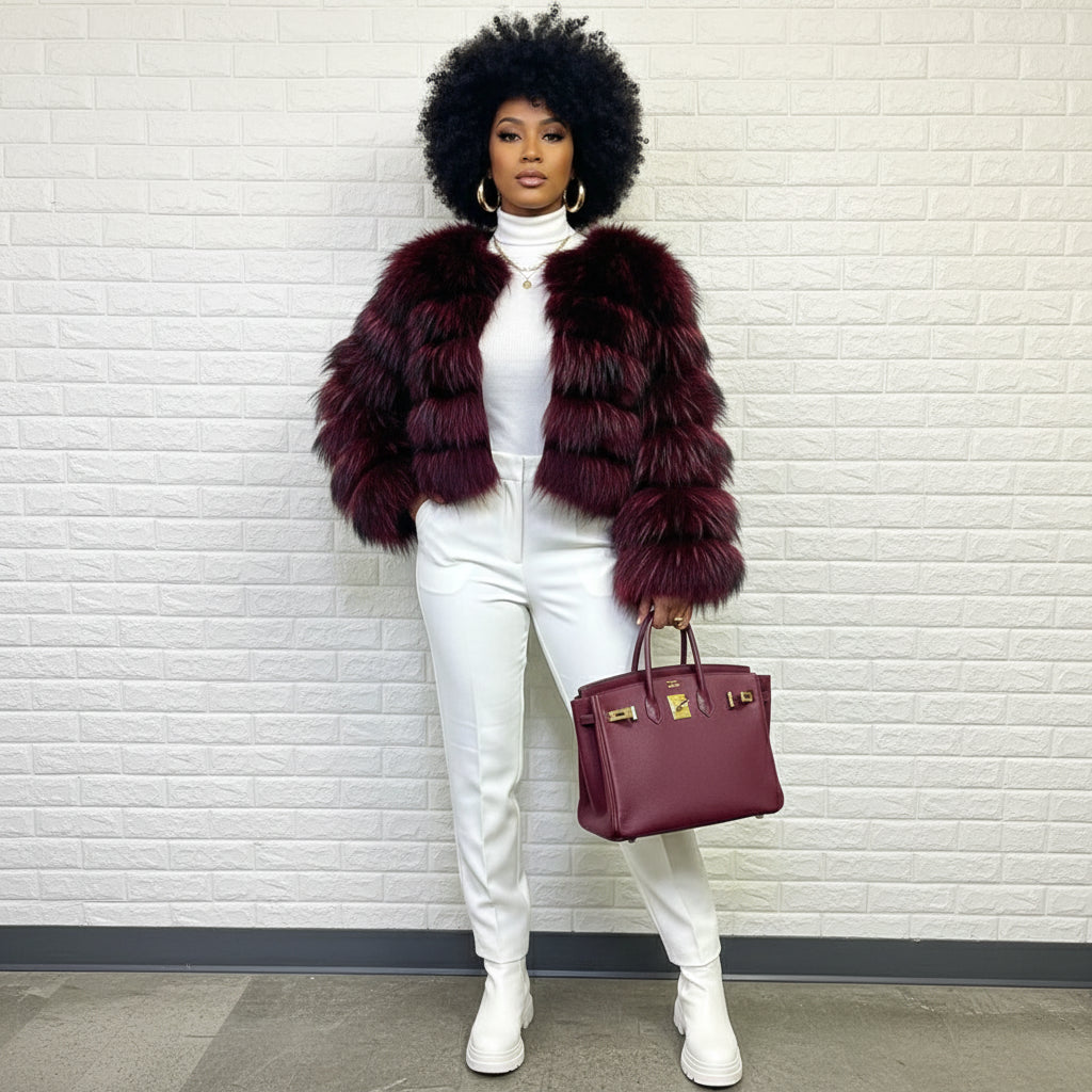 Red and black fur coat with a textured background